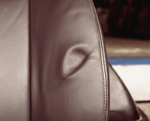 Dent on leather seat