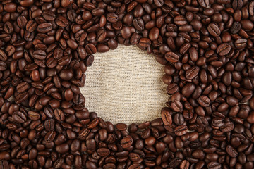  Photo  of coffee beans on hessian textile background