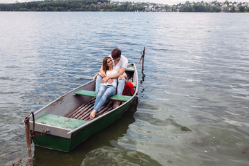 Fototapeta na wymiar Couple in boat