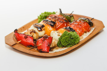 Grilled vegetables on white background for the menu