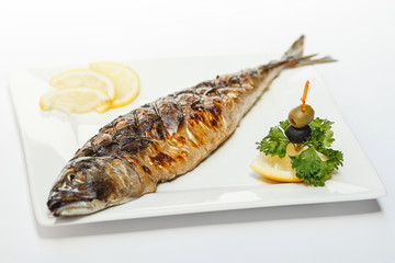 Fried fishes on white background for the menu