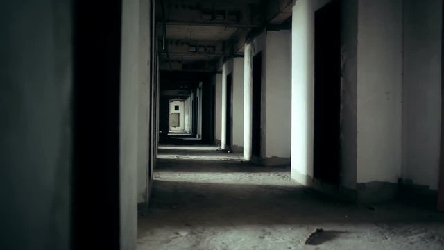 Horror movie scene of hallway abandoned building by camera dolly with tracking shot in HD, can use any background