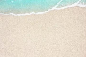 Papier Peint photo Eau Vague douce de l& 39 océan sur la plage de sable, arrière-plan.