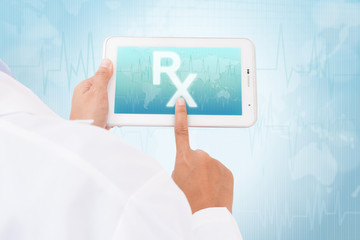 Doctor hand touch screen Prescription symbol on a tablet. medical icon