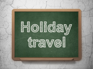 Travel concept: Holiday Travel on chalkboard background