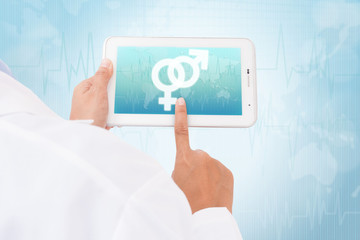 Doctor hand touch screen male and female symbol on a tablet. medical icon 