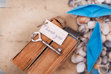 Thank you sign on vintage key and old book - vintage style