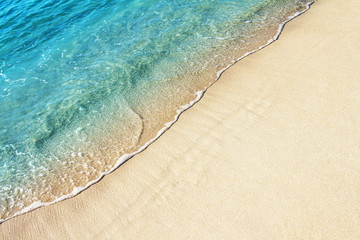 Fototapeta Soft ocean wave on the sandy beach, background. obraz