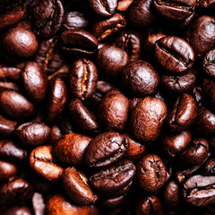 Roasted coffee beans as a background. Coffee bean wallpaper macr
