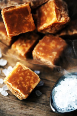 Sweet caramel candies.  Salted caramel pieces and sea salt close