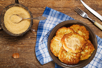 Homemade potato pancakes with brown sugar from cane.
