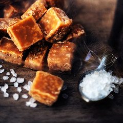 Sweet caramel candies.  Salted caramel pieces and sea salt close