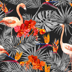 Fototapeta premium Flamingo, tropical leaves, exotic flowers. Seamless pattern, black background. Watercolor
