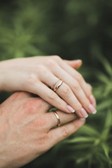 Close up of hands  couple showing the wedding ring