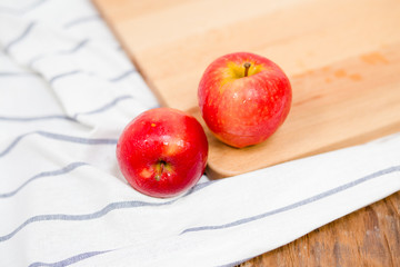 Red Apple on Wood Chop Block
