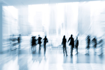 group of people in the lobby business center and blue tonality