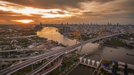 Fototapeta premium aerial view of bhumiphol bridge crossing chaopraya river importa