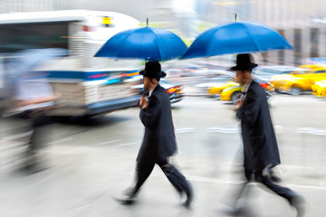 Jewish group of business people in the street