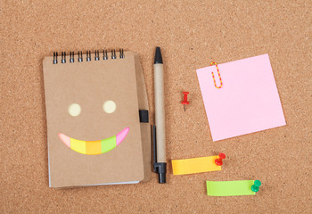 book note on cork board
