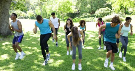 Boot camp class jogging on the spot - Powered by Adobe