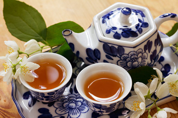 Jasmine green tea and jasmine flowers.