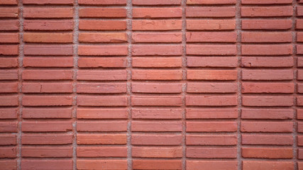 Wall of red bricks, brick background