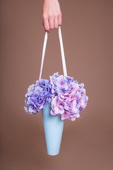 close up of paper box with hydrangea flowers