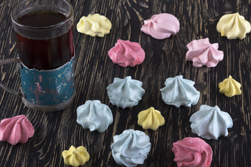 Meringue Cookies and glass of tea