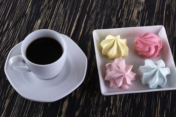 Meringue Cookies and cup of coffee.