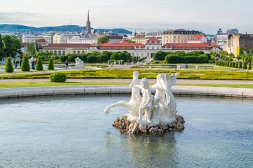 Fotobehang Pool with baroque sculpture in Belvedere gardens and Lower Belvedere Palace in Vienna, Austria © TasfotoNL