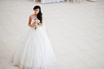 Temptation model brunette bride at exciting wedding dress with w