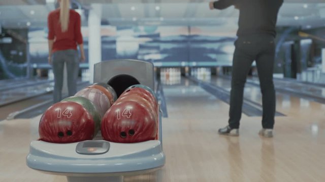 Group of people playing bowling game