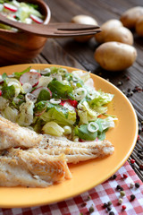 Roasted cod with fresh radish, lettuce and arugula salad