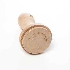 Blank wooden stamp on white