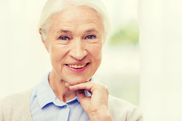 happy senior woman face at home