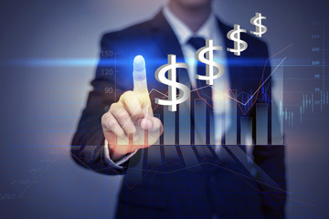 Obraz premium Close up of businessman touching finance graph in virtual screen