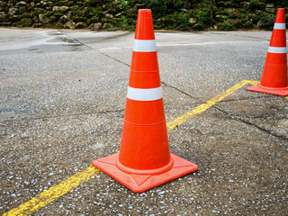 Traffic cone on the asphalt road