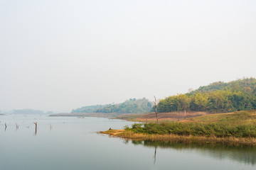 Dry lake in summer and haze day.