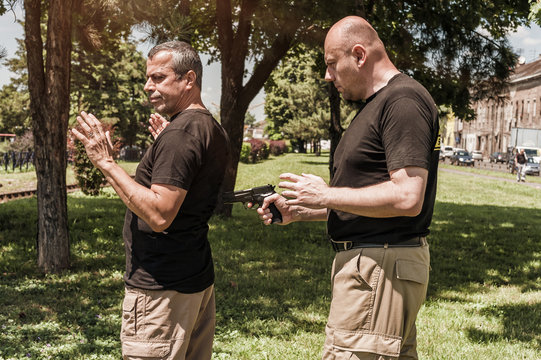 Kapap instructor demonstrates self defense techniques against a gun