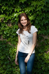 Fototapeta premium young woman in a park