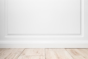 Empty room, white wall and wooden floor