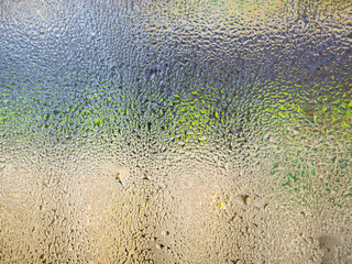 water drops on supermarket refrigerator glass