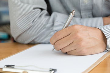 Businessman signing a contract