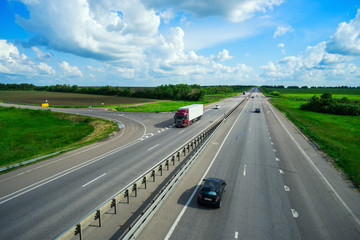 Fototapeta premium Cars driving on the road