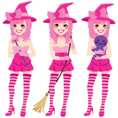 Beautiful magical sexy pink witch posing with magic scepter, voodoo doll and broom