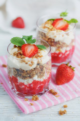 Dessert with fresh berries, cottage  cheese, granola and berries