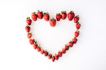 heart made with strawberry, flat lay