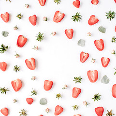 Colourful bright pattern made of strawberries, pink rose buds and leaves