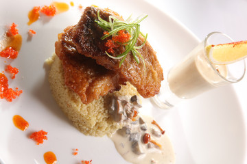 Fried CARP with garnish and mushroom sauce