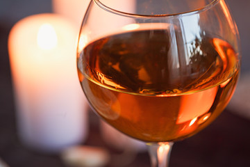 Romantic dinner with wine and candles on a table